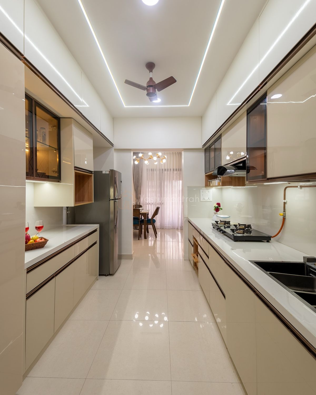 Parallel modular kitchen with counters and cabinets on two facing walls