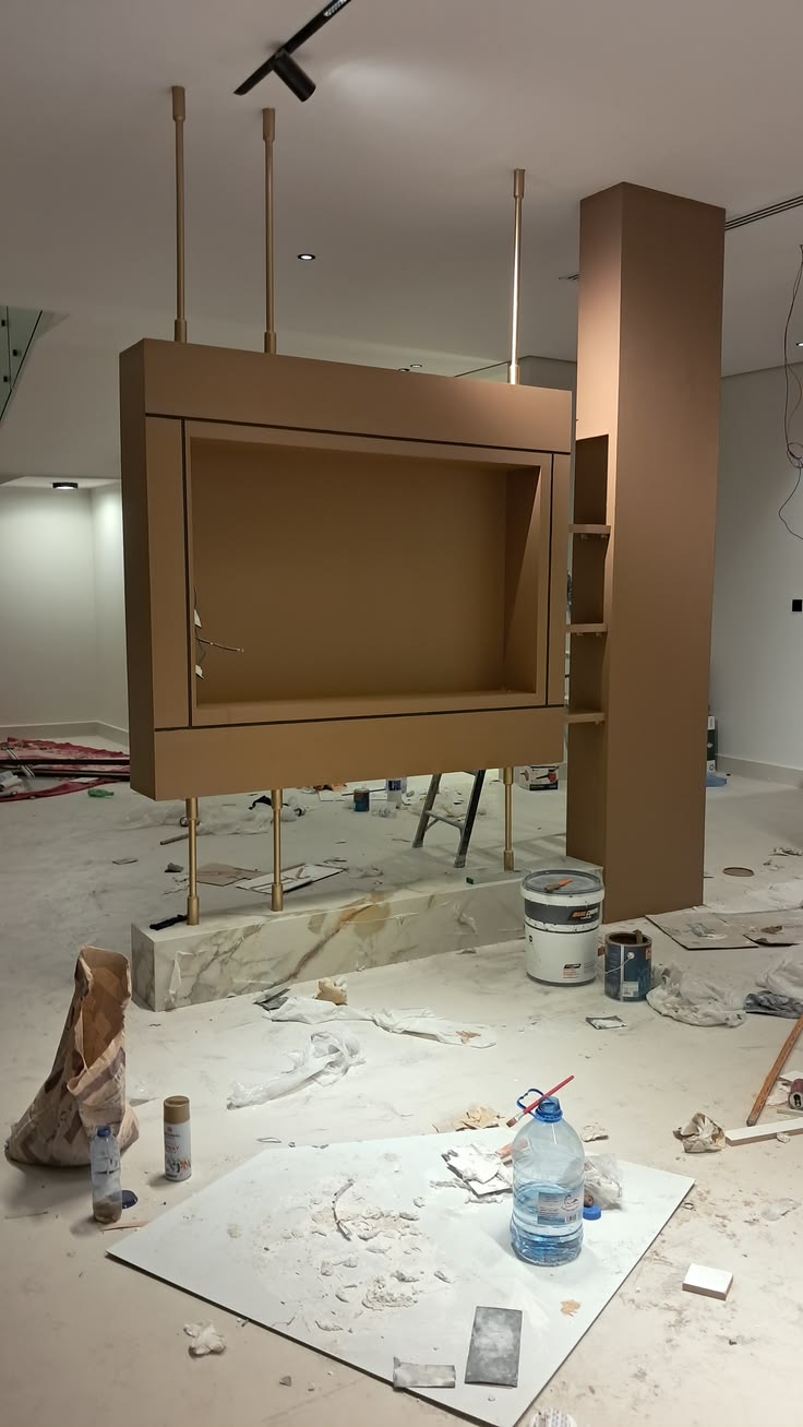 Custom floor-standing TV console and partition under construction